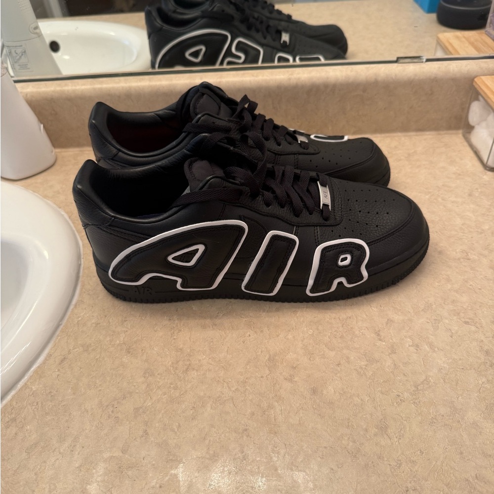 Black Sneakers with Bold White 'AIR' Design